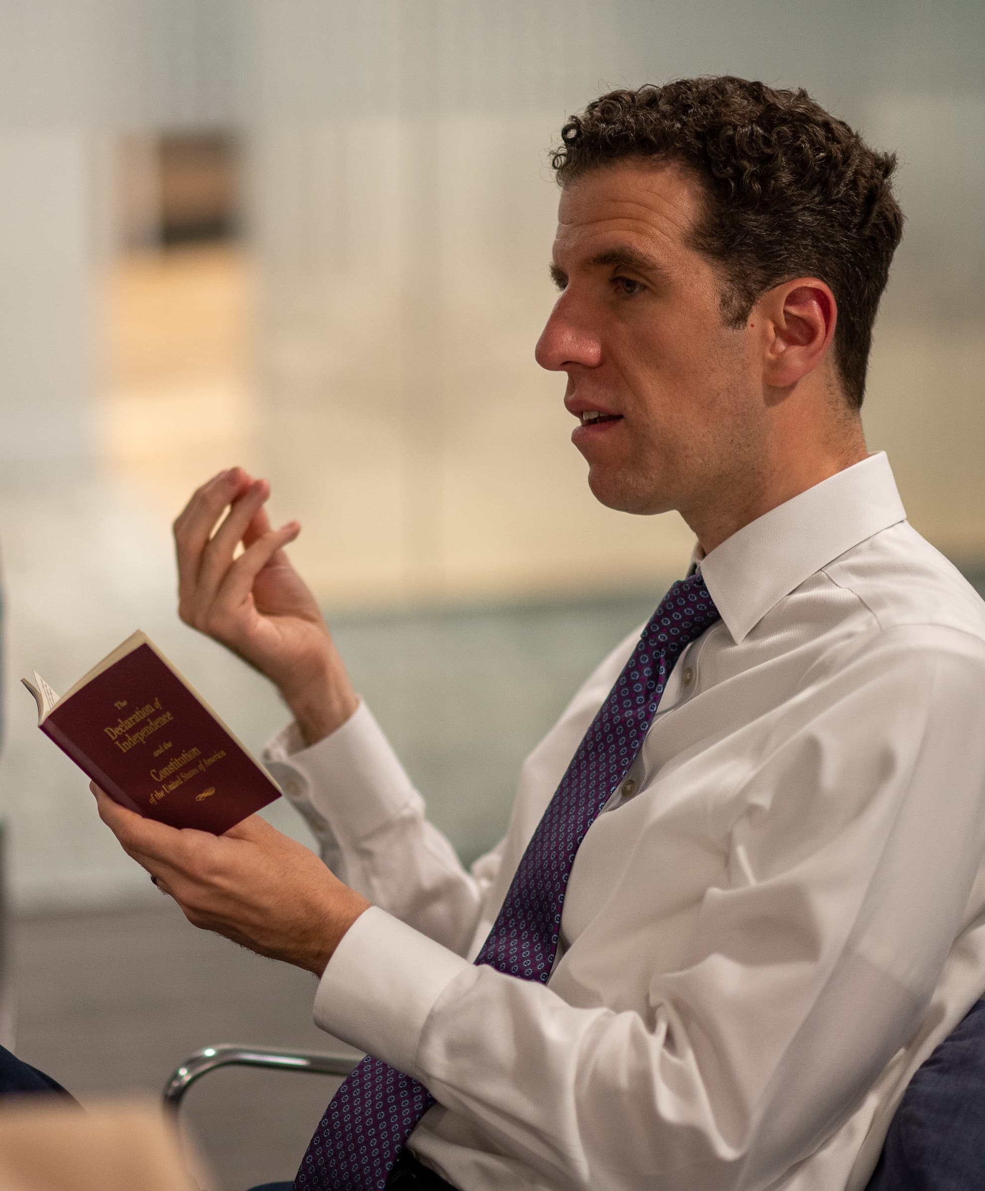 A speaker at a podium